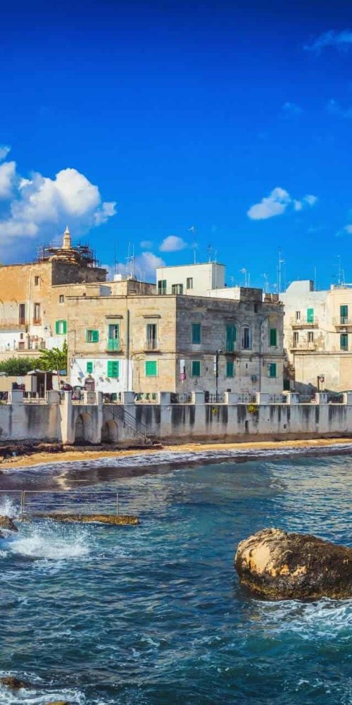 Bicycles parked near a Monopoli street