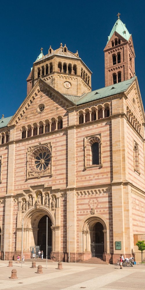 Cyclists and boat on the Rhine in Speyer